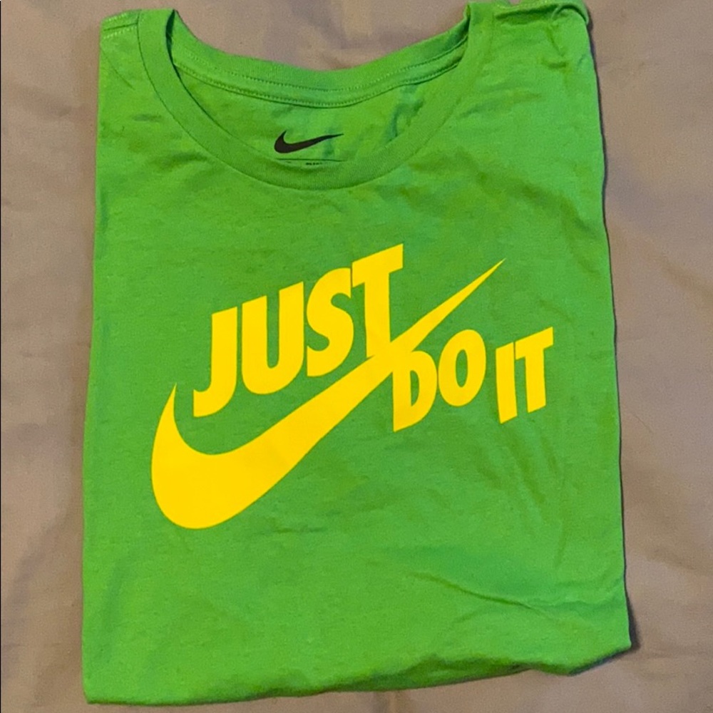 Green woman’s Nike tshirt